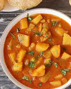 Bateta Nu Rasavalu Shak | Simple Vegan Potato curry is very common sabzi in every Gujarati thali. It is traditional Gujarati Side dish.