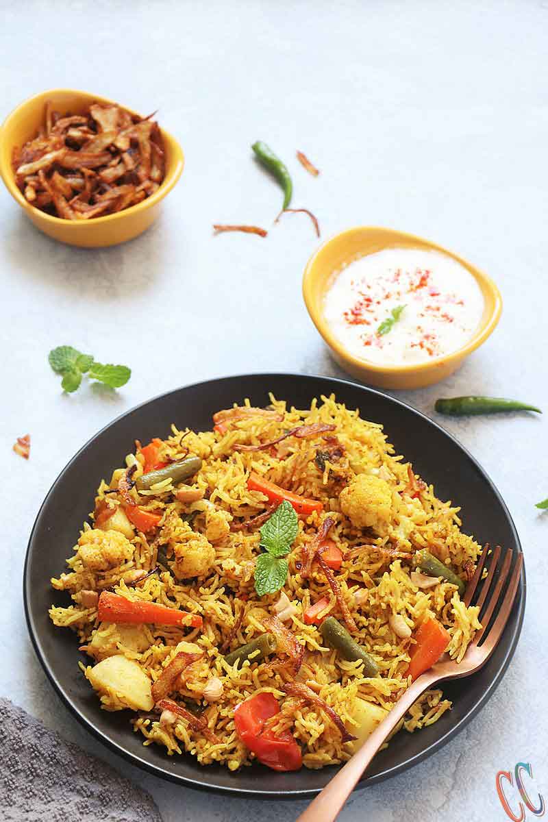 Instant Pot Vegetable Biryani - A mouth watering, bold, flavorful, universally loved Indian One Pot Rice Dish which is packed with vegetables and flavorsome spices. Biryanis are one of the most royal and grand rice based dish from Indian Cuisine.