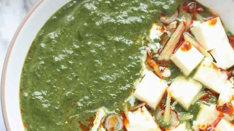 Instant Pot Palak Paneer - Indian Cottage Cheese in Smooth, luscious, Delicious, Creamy Spinach Gravy. Palak Paneer is one of the most loved North Indian Dishes across the world. It is Eaten with Roti, Paratha, Naan, Parotta or Rice. This Vegetarian Indian Instant Pot Recipe is a healthy weeknight dinner recipe that's naturally gluten free, paleo and can easily be made Vegan by using tofu instead of Paneer and Oil instant of Ghee/clarified butter.