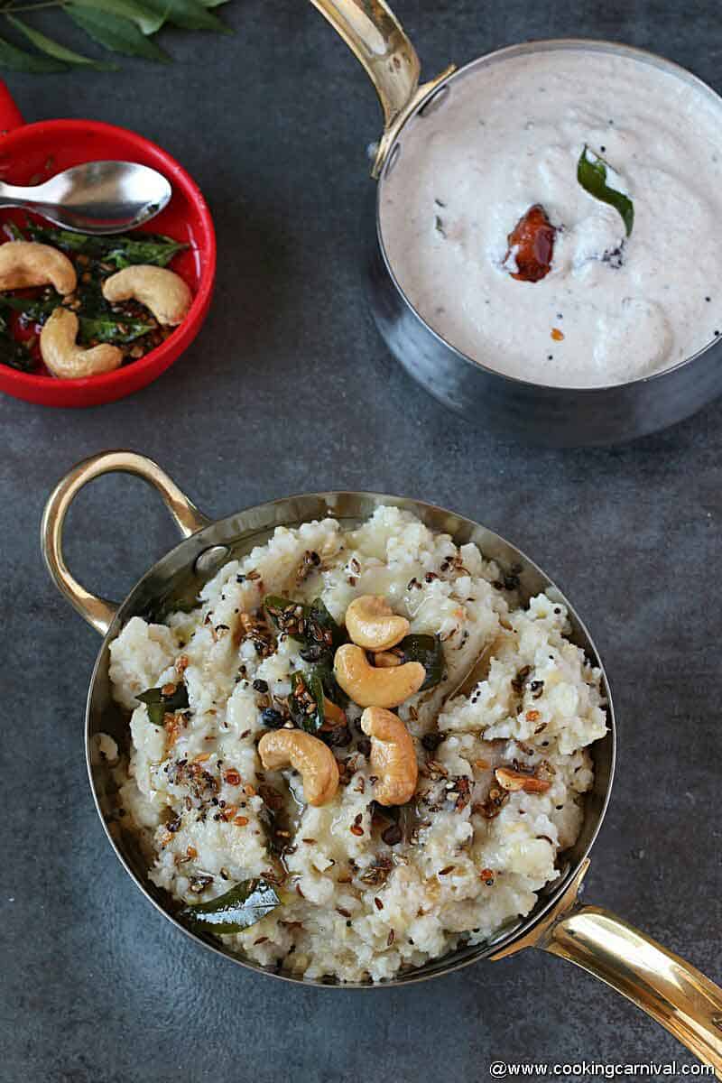 Ven Pongal in a steel bowl with peanut chutney on the sides