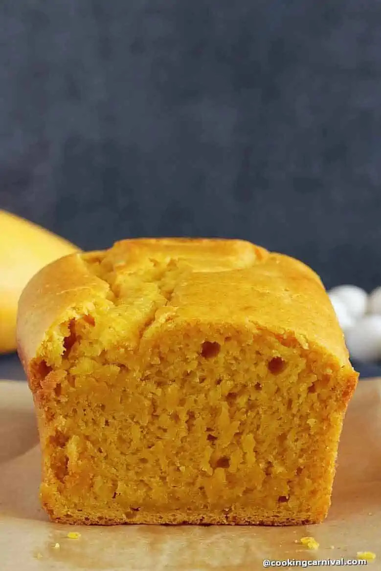 Showing texture of Eggless Mango cake