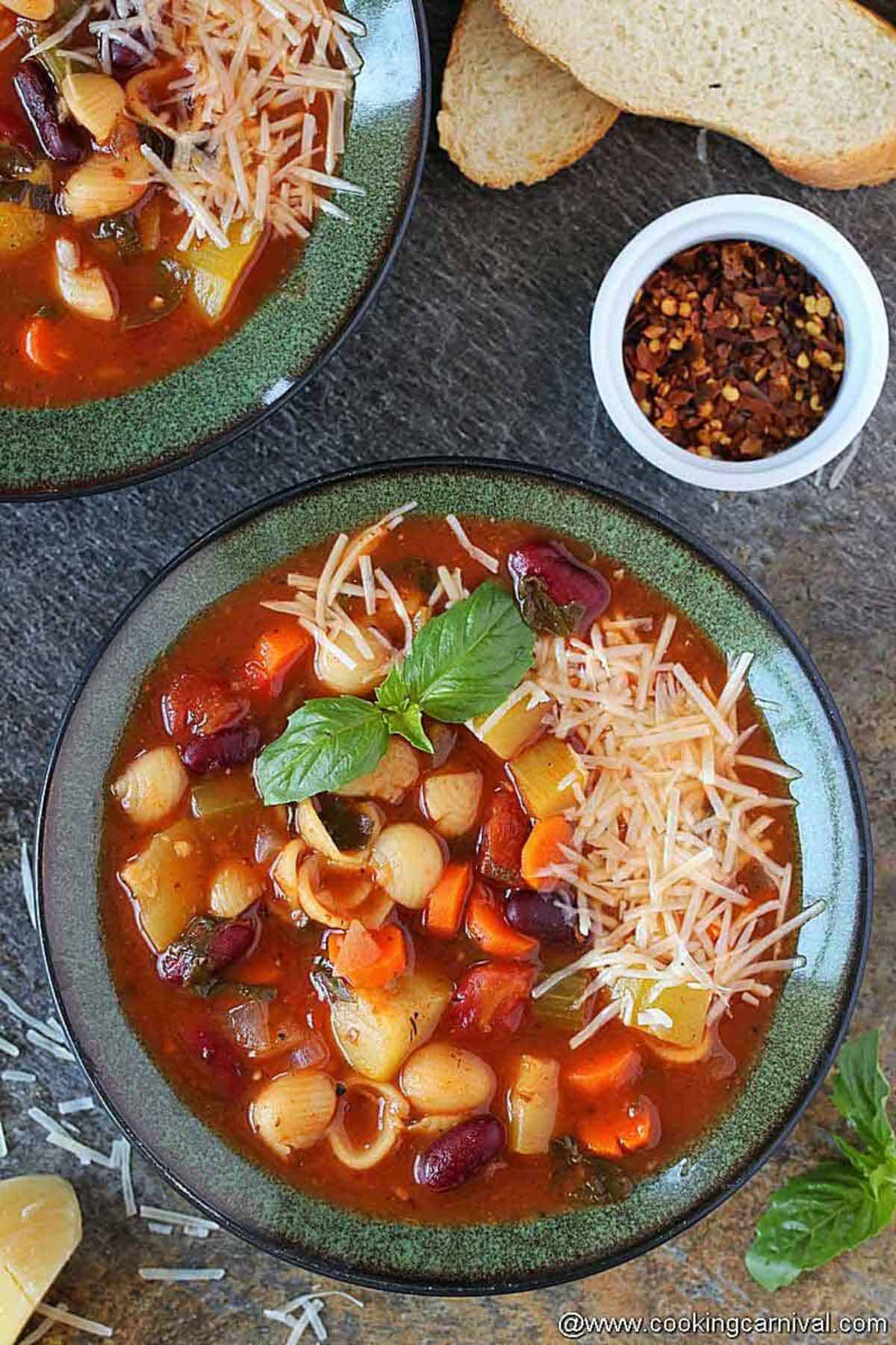 Instant pot minestrone soup in green bowl