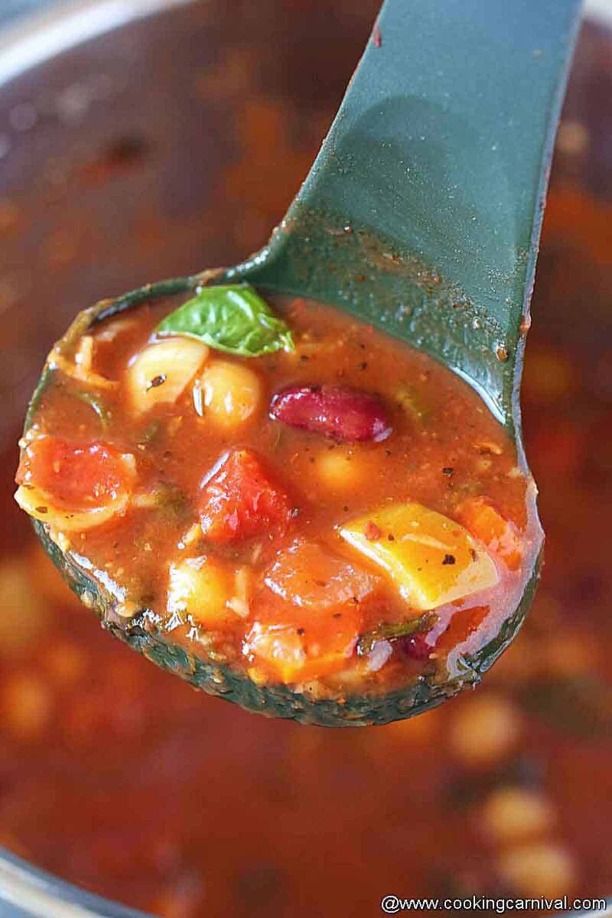 ladle full of minestrone soup