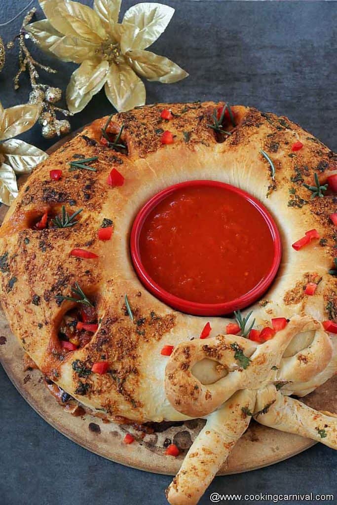 Mexican Stromboli Christmas Wreath Appetizer served with marinara saucefrom the side