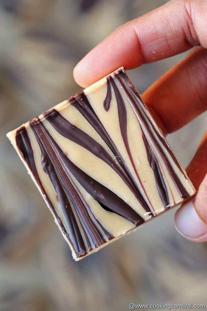 showing a piece of Tiger butter fudge