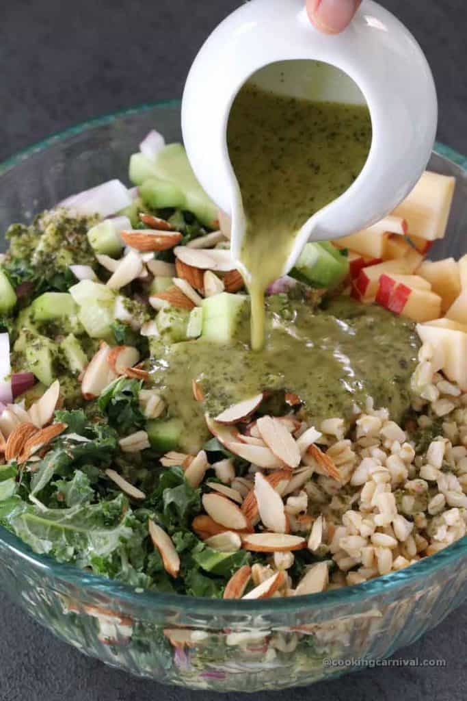 adding mint dressing in wheat berry salad