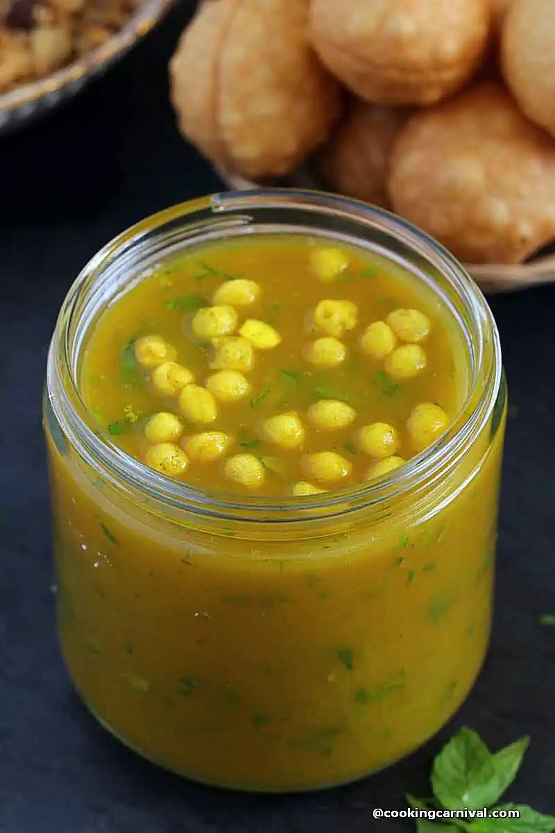Pani puri ka pani with mango in a jar