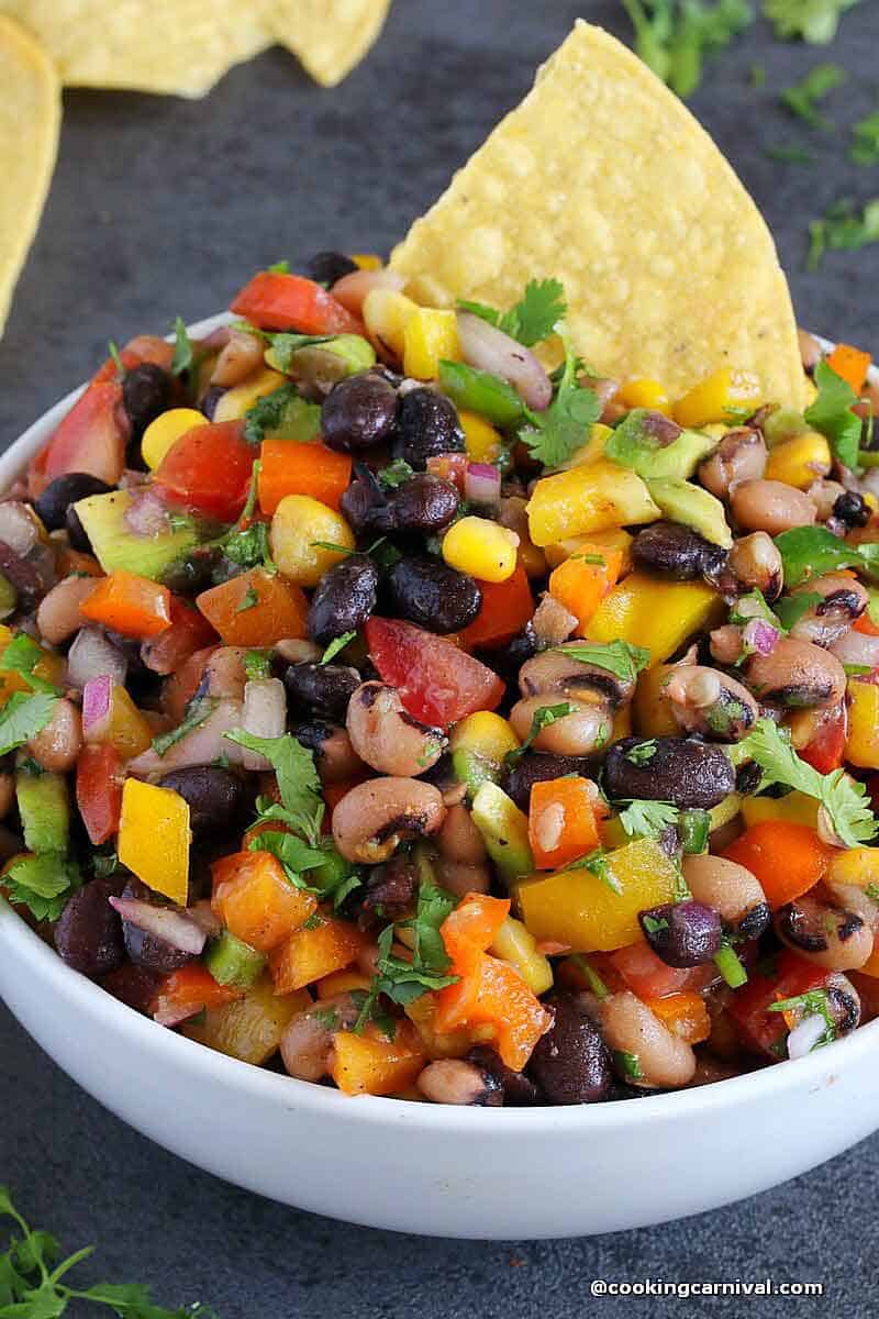 Texas caviar in a bowl served with tortilla chips