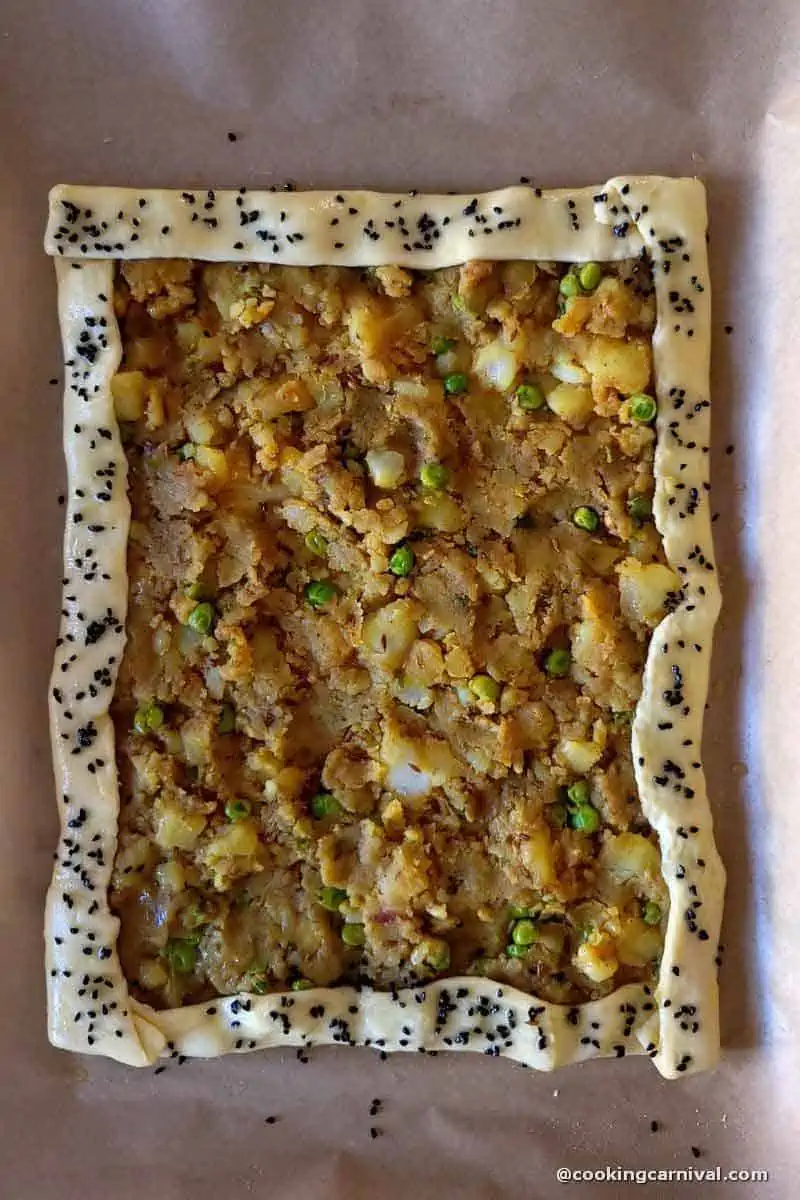 Samosa Puff pastry tart ready to baked in to the oven.