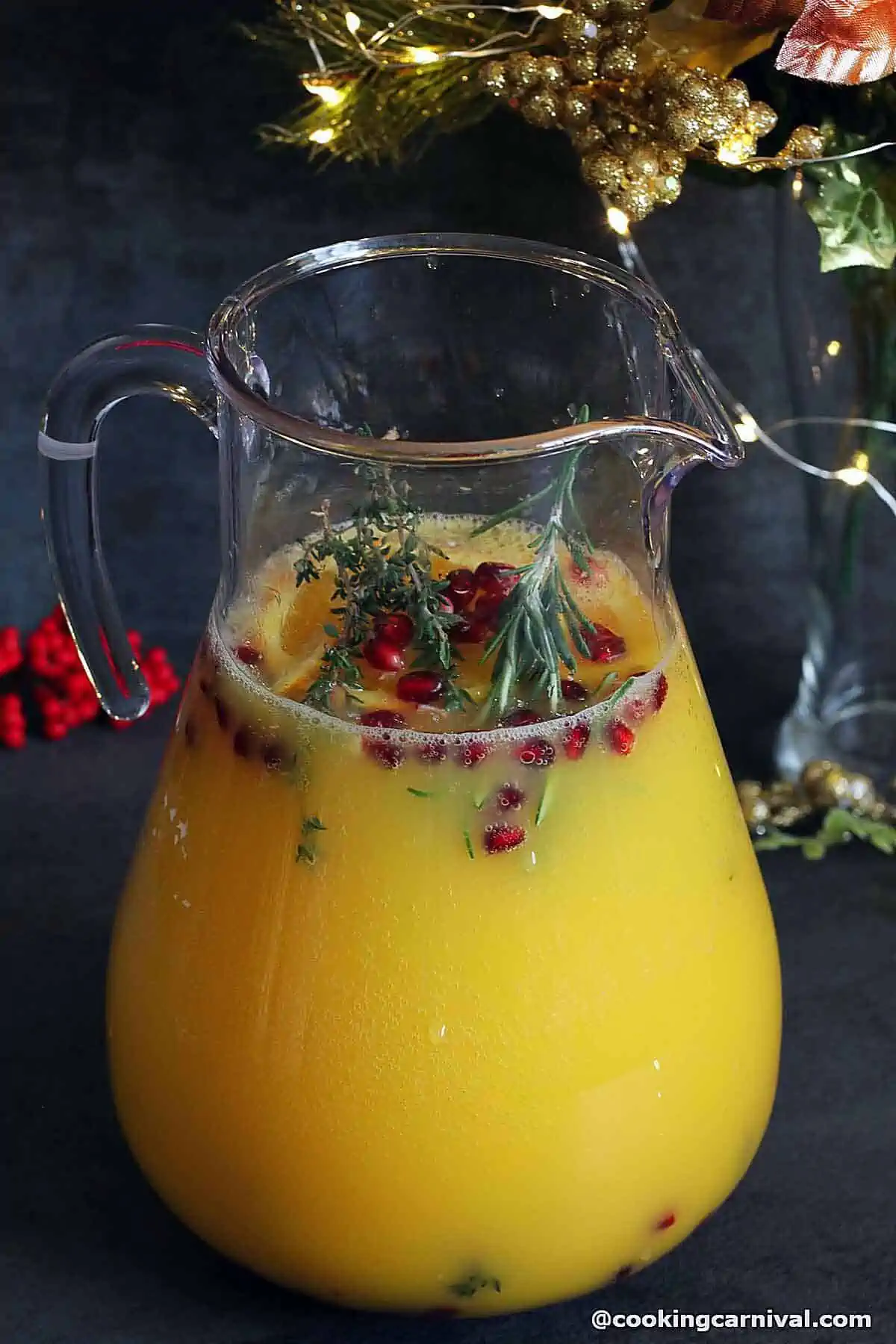 Orange Mocktail in a glass pitcher