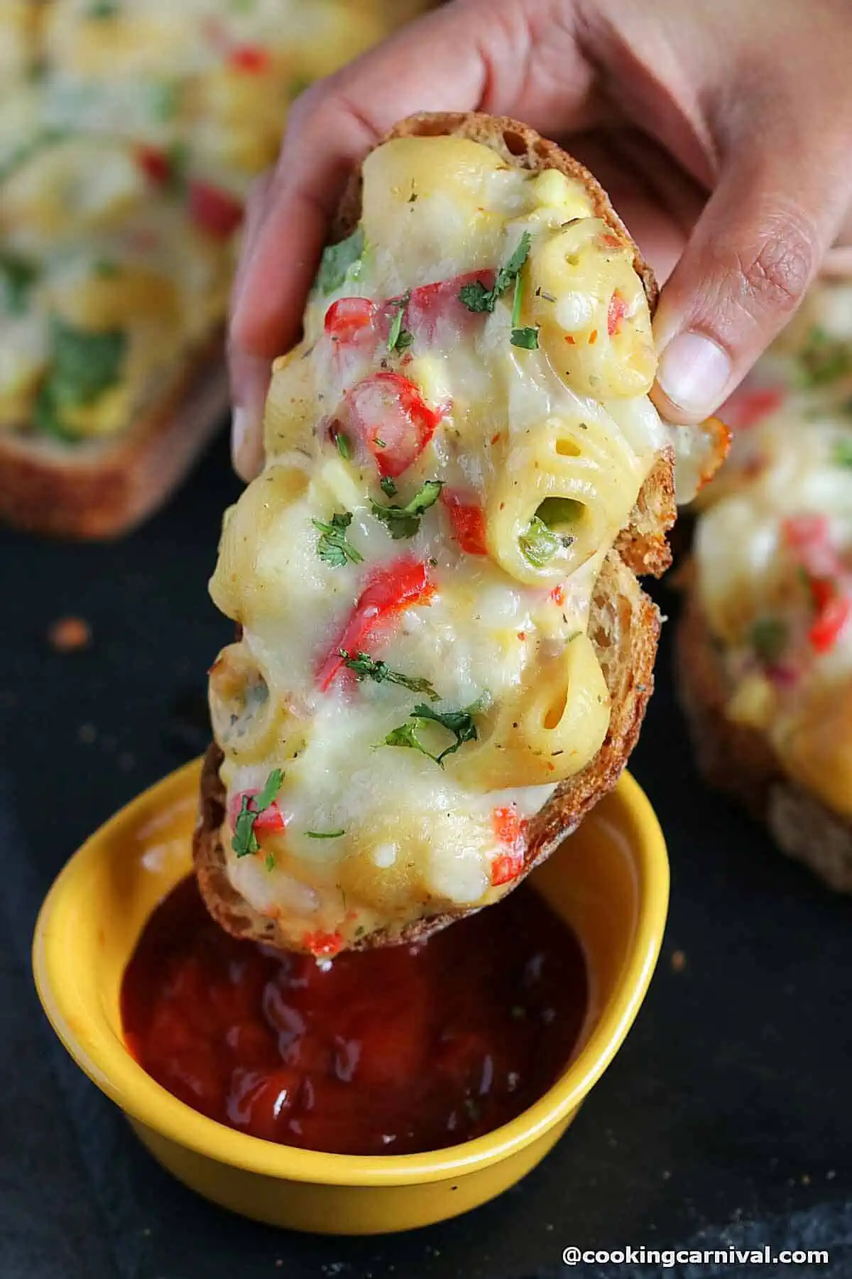 Dipping Cheese Corn Pasta Open Sandwich in ketchup