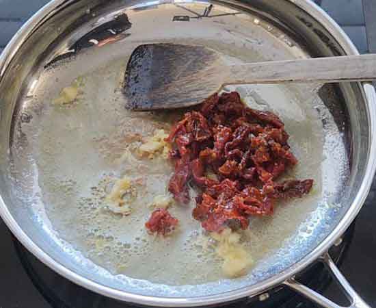 sun-dried tomatoes and garlic in butter.