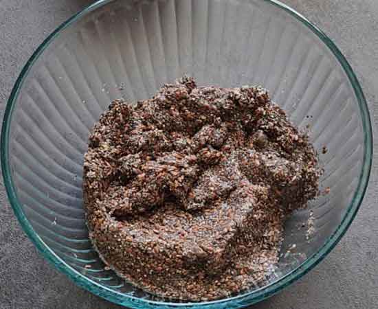 mixture of flex seeds, chia seeds and hot water in a glass bowl.