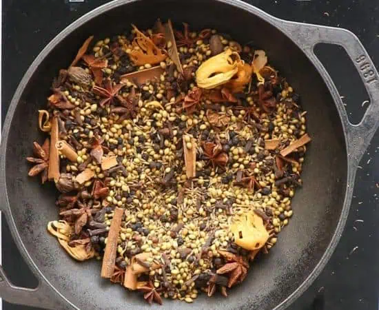 Roasting Indian Whole spices in a cast iron pan.