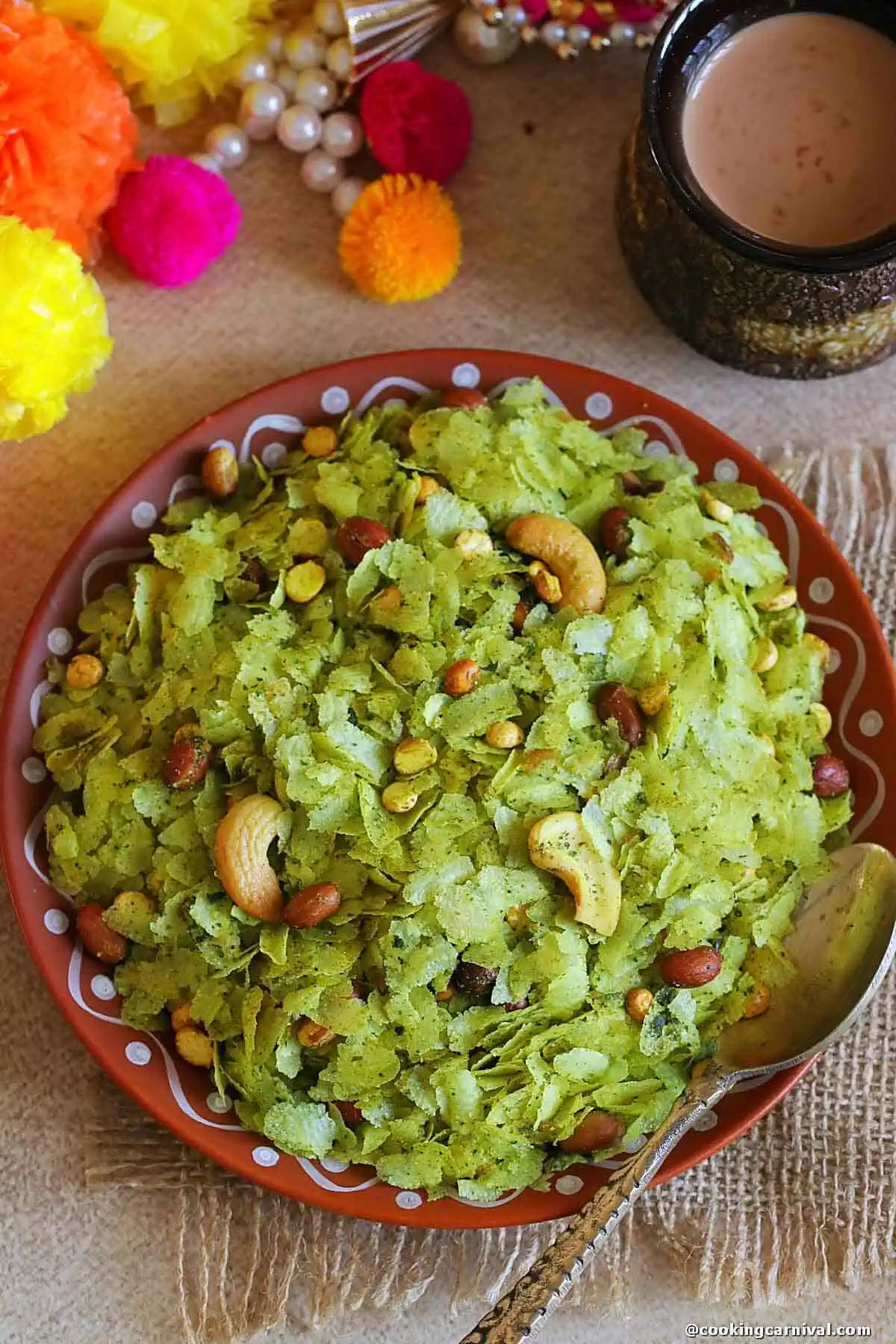 thin poha chivda on a brown plate.