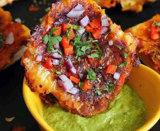 masala baked beans puff pastry dipped in green chutney.