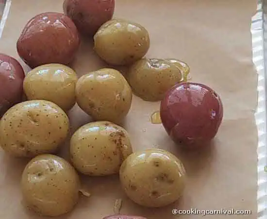 boiled baby potatoes coated in Evoo