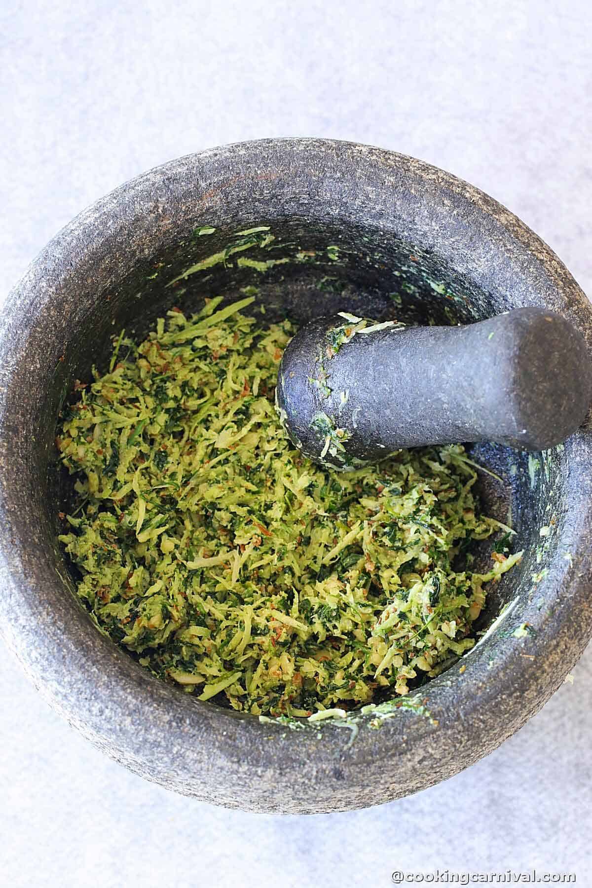 Moringa kairi thecha in morter and pastel.