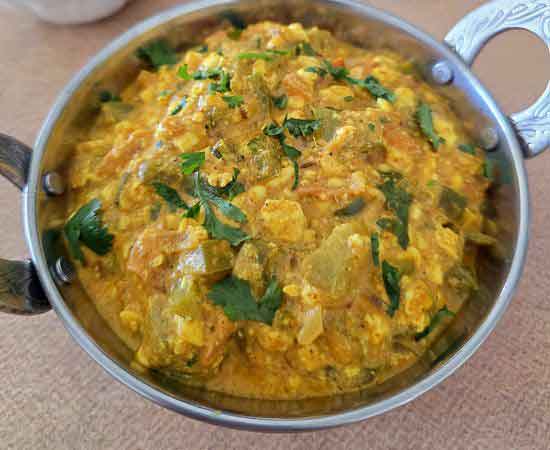 cottage cheese bhurji garnished with cilantro.