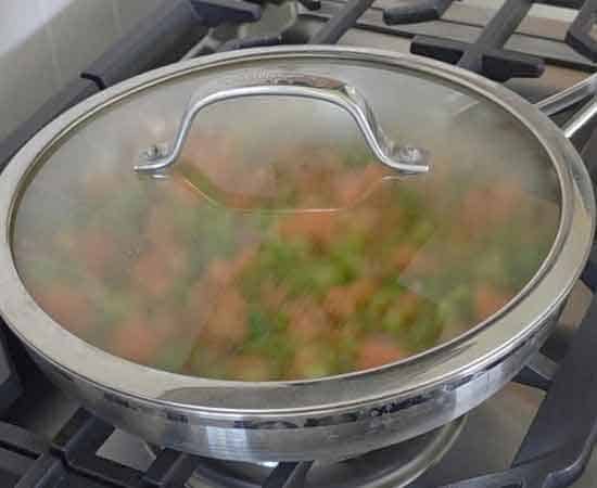 cover the pan and cooking the aromatics.