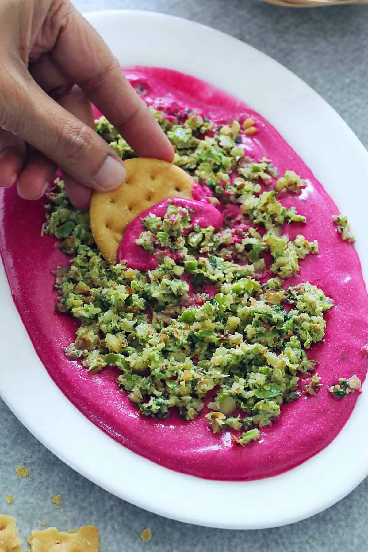 Taking beet paneer dip and thecha with papdi